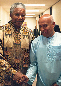 President Mandela with Sri-Chinmoy at the Presidential Mansion in Pretoria.jpg